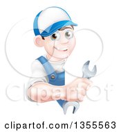 Poster, Art Print Of Happy Young Brunette Caucasian Mechanic Man In Blue Wearing A Baseball Cap Holding A Wrench Around A Sign