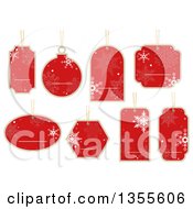 Clipart Of Red Snowflake Christmas Gift Tags Royalty Free Vector Illustration by dero