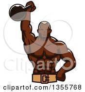 Black Male Bodybuilder Holding Up A Kettlebell