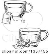 Clipart Of Black And White Sketched Cups Of Hot Tea With A Bag And Cowberry Branch Royalty Free Vector Illustration