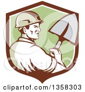 Poster, Art Print Of Retro Male Construction Worker Builder Holding A Shovel In A Brown White And Green Shield