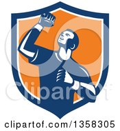 Poster, Art Print Of Retro Male Athlete Doing A Fist Pump In A Blue White And Orange Shield