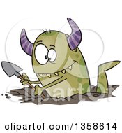 Cartoon Green Horned Monster Digging A Hole