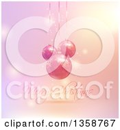 Clipart Of A 3d Suspended Snowflake Baubles Over Merry Christmas Text On Gradient Royalty Free Vector Illustration