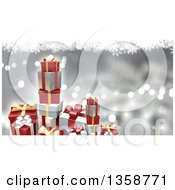 Poster, Art Print Of 3d Stacks Of Christmas Gifts Over A Silver Background Of Bokeh Lights And Snowflakes