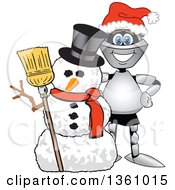 Lancer School Mascot Wearing A Santa Hat And Smiling By A Christmas Snowman