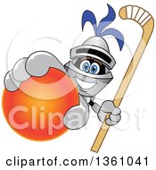Lancer School Mascot Holding Up A Stick And A Field Hockey Ball