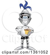 Clipart Of A Lancer School Mascot Holding A Cupake Royalty Free Vector Illustration