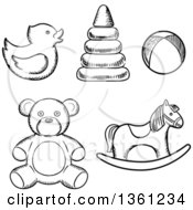 Clipart Of Black And White Sketched Baby Toys Royalty Free Vector Illustration