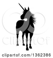 Poster, Art Print Of Black Silhouetted Mythical Unicorn Standing And Looking To The Left