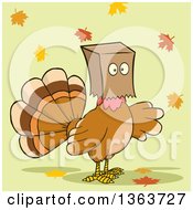 Cartoon Thanksgiving Turkey Bird Wearing A Bag Over His Head With Autumn Leaves On Green