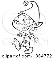 Cartoon Clipart Of A Black And White Happy Christmas Elf Kid Walking Royalty Free Vector Illustration