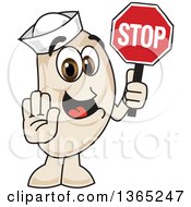 Clipart Of A Navy Bean Mascot Character Gesturing And Holding A Stop Sign Royalty Free Vector Illustration by Toons4Biz