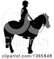 Clipart Of A Black Sihouetted Girl Mounted On A Horse Ready For Equestrian Games Royalty Free Vector Illustration