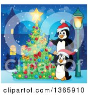 Poster, Art Print Of Cute Christmas Penguins Decorating A Tree In A Village At Night