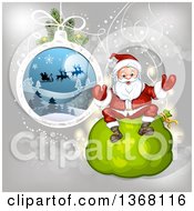 Poster, Art Print Of Suspended Christmas Bauble And Santa Sitting On A Sack