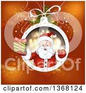 Poster, Art Print Of Suspended Christmas Bauble With Santa Holding A Gift Over Red