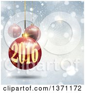 Clipart Of A New Year 2016 Bauble Over Blue Rays And Flares With Snowflakes Royalty Free Vector Illustration