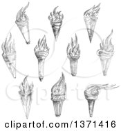 Clipart Of Black And White Sketched Torches Royalty Free Vector Illustration