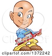 Young Bald Guy Playing A Keyboard Instrument