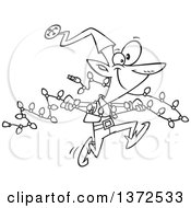 Cartoon Clipart Of A Black And White Christmas Elf Running With A Strand Of Lights Royalty Free Vector Illustration