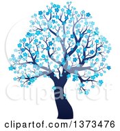 Poster, Art Print Of Silhouetted Tree With Blue Winter Blossoms