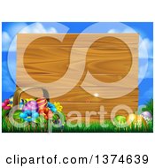 Poster, Art Print Of Basket Of Flowers And Easter Eggs In Grass In Front Of A Blank Wood Sign With Blue Sky And Light Flares