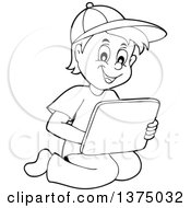 Clipart Of A Black And White Boy Kneeling And Using A Laptop Computer Royalty Free Vector Illustration by visekart