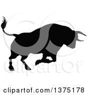 Clipart Of A Black Silhouetted Bull Charging Royalty Free Vector Illustration