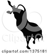 Clipart Of A Black Silhouetted Bull Bucking Royalty Free Vector Illustration