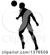 Poster, Art Print Of Black Silhouetted Male Soccer Player Athlete In Action