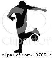 Poster, Art Print Of Black Silhouetted Male Soccer Player Athlete In Action