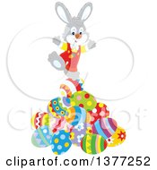 Poster, Art Print Of Gray Easter Bunny Balancing On A Pile Of Decorated Eggs