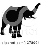 Clipart Of A Black Silhouetted Elephant Royalty Free Vector Illustration