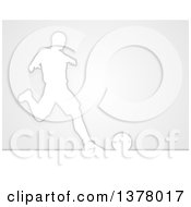 Clipart Of A White Silhouetted Male Soccer Player In Action Over Gray Royalty Free Vector Illustration by AtStockIllustration