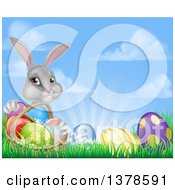 Poster, Art Print Of Happy Gray Easter Bunny With A Basket Of Eggs And Flowers In The Grass Against Sky