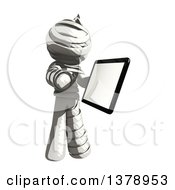 Clipart Of A Fully Bandaged Injury Victim Or Mummy Holding A Tablet Computer Royalty Free Illustration