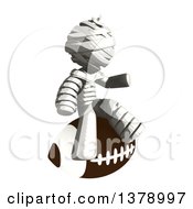 Poster, Art Print Of Fully Bandaged Injury Victim Or Mummy Sitting On A Football