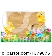 Poster, Art Print Of Cute Yellow Chicks On Easter Eggs And A Basket In The Grass Over A Blank Wood Sign