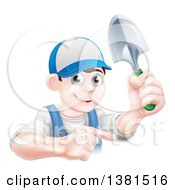 Happy Young Brunette White Male Gardener In Blue Pointing And Holding A Shovel