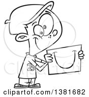 Clipart Of A Cartoon Black And White Happy Boy Sharing A Smile On A Piece Of Paper Royalty Free Vector Illustration