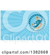Clipart Of A Retro Cargo Ship And Anchor And Blue Rays Background Or Business Card Design Royalty Free Illustration