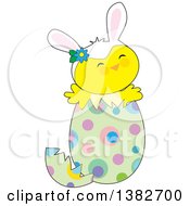 Cute Chick Wearing Bunny Ears And Popping Out Of An Easter Egg