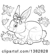 Clipart Of A Happy Bunny Rabbit Wearing A Bow Surrounded By Spring Butterflies Royalty Free Vector Illustration