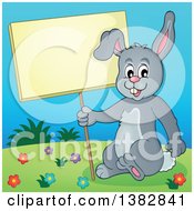 Poster, Art Print Of Happy Gray Bunny Rabbit Holding A Blank Sign On A Hill