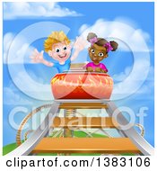 Happy White Boy And Black Girl At The Top Of A Roller Coaster Ride Against A Blue Sky With Clouds