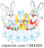 Easter Bunny Rabbits Cheering At A Table With Eggs And A Basket