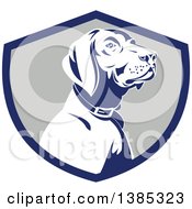 Clipart Of A Retro Pointer Hunting Dog In A Blue Gray And White Shield Royalty Free Vector Illustration by patrimonio