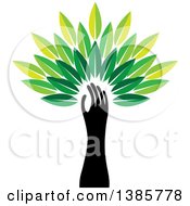 Poster, Art Print Of Black Silhouetted Hand Forming The Trunk Of A Tree With Green Leaves