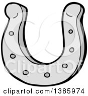 Clipart Of A Cartoon Horseshoe Royalty Free Vector Illustration by lineartestpilot
